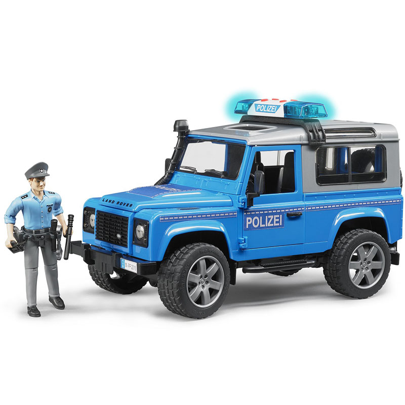 BRUDER 2597 Policejní Land Rover Defender s figurkou policisty a majákem